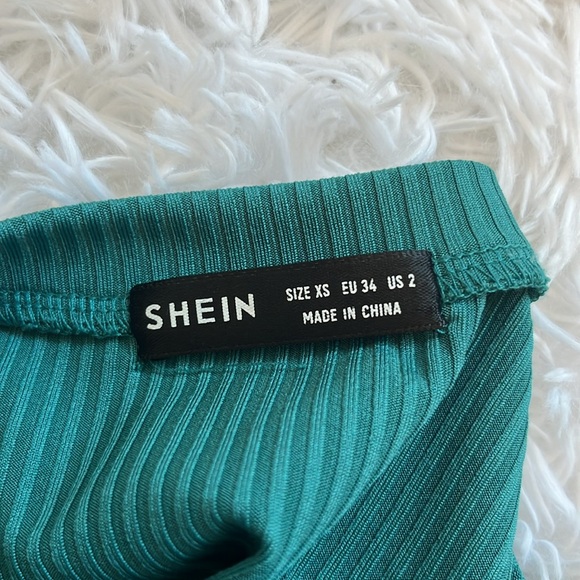 This is a shien green body con dress in size extra small - Picture 3 of 4